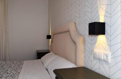 Postel nebo postele na pokoji v ubytování Apartamentos Ronda Luz