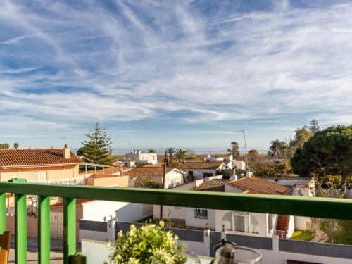 una vista de una ciudad desde un balcón en Apartment Paola by Interhome, en L'Eucaliptus
