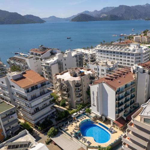 an aerial view of a city with a body of water at Aurasia Design Hotel in Marmaris