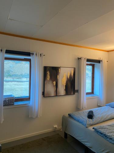 Postel nebo postele na pokoji v ubytování Unstad Surfpacker Hostel