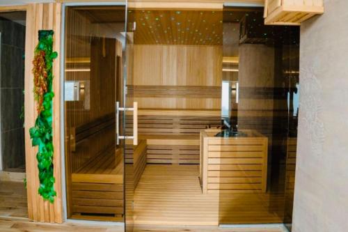 a view of a room with a desk in a room at Gold Apartments Kopaonik in Kopaonik