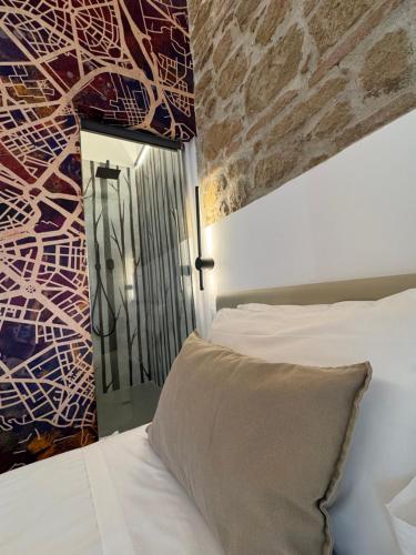 Una cama o camas en una habitación de Hotel Felice