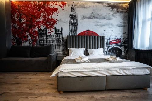 Postel nebo postele na pokoji v ubytování City Boutique Hotel Reghin