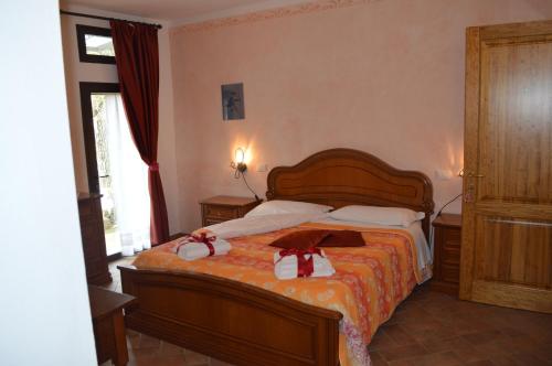 A bed or beds in a room at Azienda Agricola Polveraia