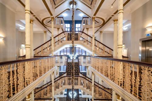 a view of a staircase in a building at Britannia Hotel City Centre Manchester in Manchester