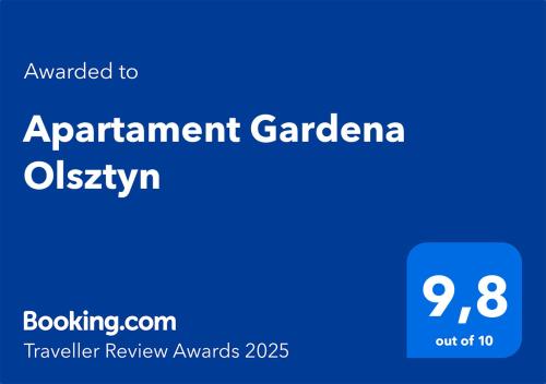 a blue sign with the words apartment gardenaria oisiry at Apartament Gardena Olsztyn in Olsztyn