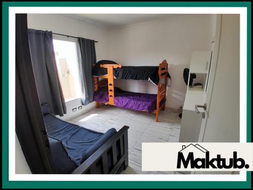 Ένα ή περισσότερα κρεβάτια σε δωμάτιο στο Maktub Alojamiento
