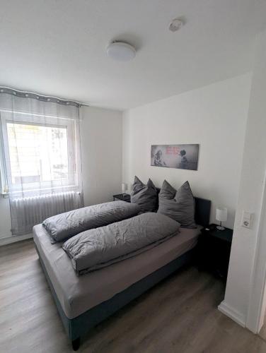 Ένα ή περισσότερα κρεβάτια σε δωμάτιο στο 2 Zimmer Wohnung Zentrum Offenburg