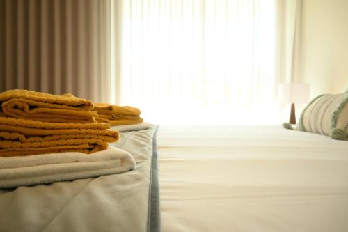 Ένα ή περισσότερα κρεβάτια σε δωμάτιο στο BaySun Apartment & SPA - Bayline