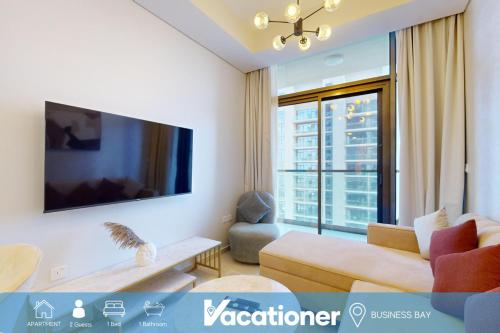 Vacationer Holiday Homes I Calm 1 Bed l Free Parking, Wi-Fi & Pool Access l Business Bay