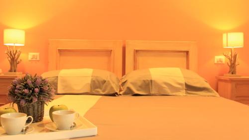 Ένα ή περισσότερα κρεβάτια σε δωμάτιο στο La Trigola