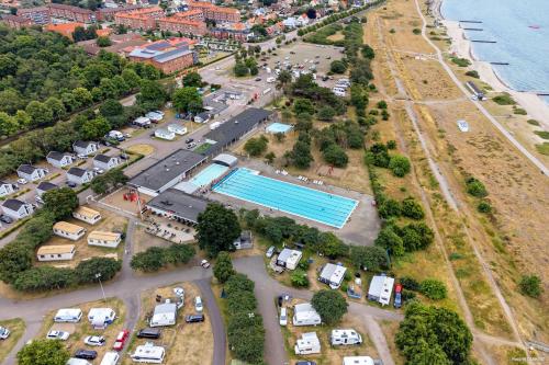 an aerial view of a parking lot with a swimming pool at First Camp Råå Vallar-Helsingborg in Råå 