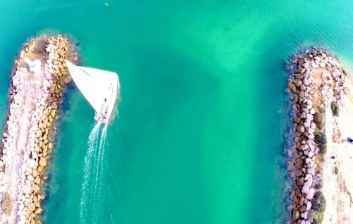 an aerial view of a boat in the water at Casa do Carmo Fuzeta by Junto ao Mar in Fuzeta