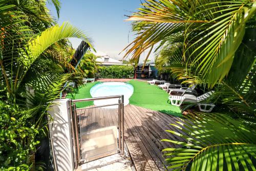 Maison charmante à Sainte-Anne avec piscine partagée.