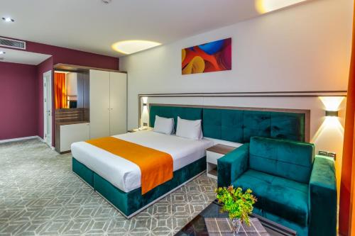 Postel nebo postele na pokoji v ubytování ALBA HOTEL & SPA