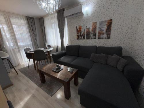 Posezení v ubytování Snowflake in Royal Park, Shuttle, SPA