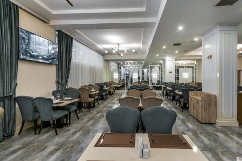 TV a/nebo společenská místnost v ubytování ALBA HOTEL & SPA