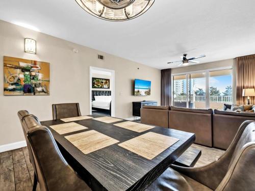 a dining room with a table and chairs at Ariel Dunes 209 in Coffeyville