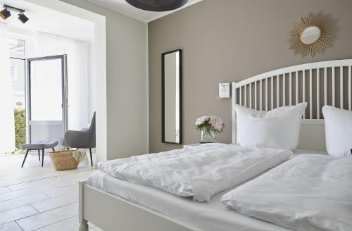 Ένα ή περισσότερα κρεβάτια σε δωμάτιο στο Haus Ostsee