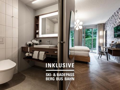 Koupelna v ubytování Badehotel Belvair
