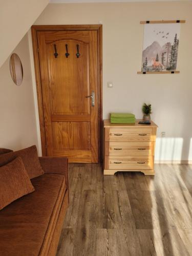 Χώρος καθιστικού στο Pokoje dwuosobowe, czteroosobowe Apartament II Chochołów