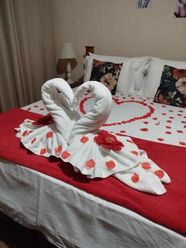 Postel nebo postele na pokoji v ubytování Pousada Charme Tiradentes