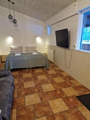 Postel nebo postele na pokoji v ubytování Studio apartment in countryside