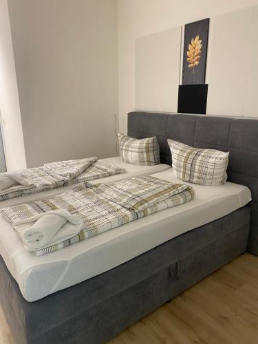 Ένα ή περισσότερα κρεβάτια σε δωμάτιο στο Goldstar Hotel Hannover