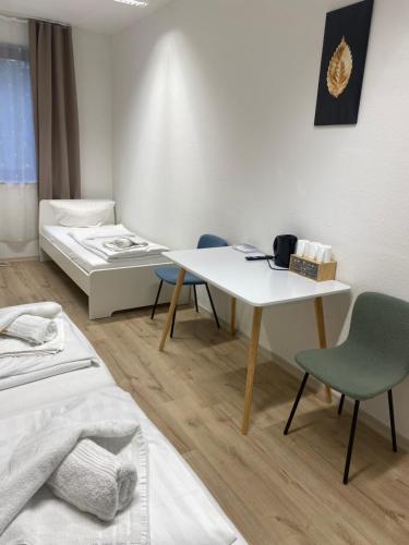 Ένα ή περισσότερα κρεβάτια σε δωμάτιο στο Goldstar Hotel Hannover
