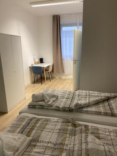 Ένα ή περισσότερα κρεβάτια σε δωμάτιο στο Goldstar Hotel Hannover