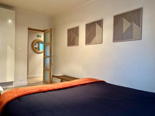 Ένα ή περισσότερα κρεβάτια σε δωμάτιο στο La Mer