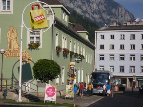 a group of people standing in front of a building at Eisenerzer Hof in Eisenerz