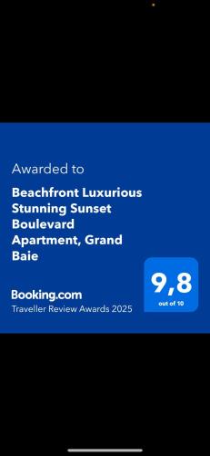 a screenshot of a cell phone with a text message at Beachfront Luxurious Stunning Sunset Boulevard Apartment, Grand Baie in Grand Baie
