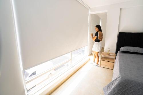 Postel nebo postele na pokoji v ubytování Lujoso Apartamento Céntrico 206