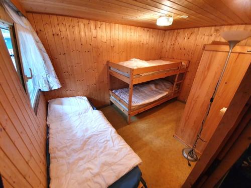 Postel nebo postele na pokoji v ubytování Feriensiedlung Schwalbennest