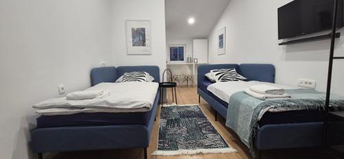 Posteľ alebo postele v izbe v ubytovaní X Rooms