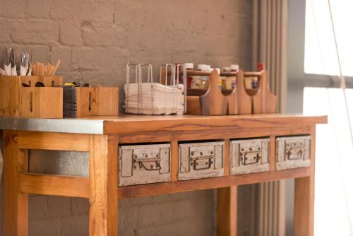 a wooden table with tools on top of it at YHA Bristol in Bristol