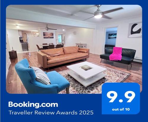 a living room with a couch and two chairs at Modern and spacious villa close to NYC/Brooklyn/Queens/Garden City in Westbury