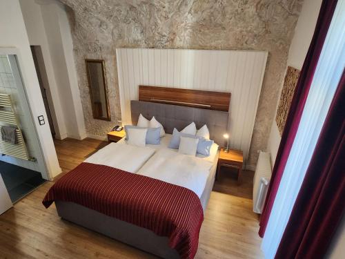 Postel nebo postele na pokoji v ubytování Hotel Almrausch