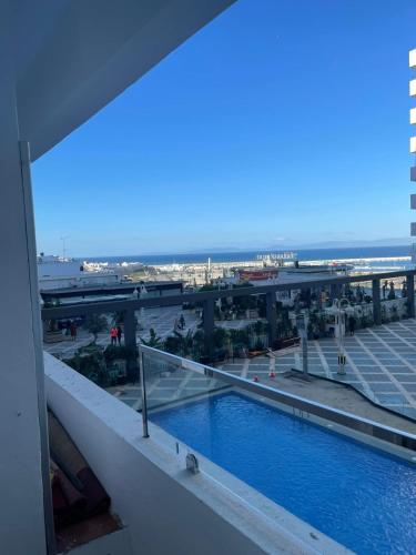 a view from the balcony of a building with a swimming pool at Tanger City 2 in Tangier