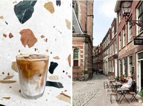 a cup of coffee sitting on a table on a street at Villa Abbekerk - Bed & Breakfast in Abbekerk