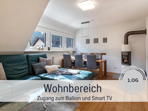 Televisyen dan/atau pusat hiburan di Ferienwohnungen Auszeit Langmatt