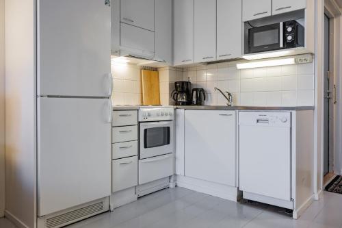 Una cocina o kitchenette en Sampo Studios