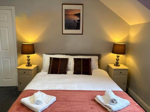 Ένα ή περισσότερα κρεβάτια σε δωμάτιο στο Cosy and convenient Sunderland apartment