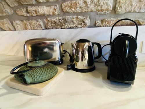 a group of appliances sitting on top of a counter at Le PARC DE LA TRICHERIE in Onet le Château