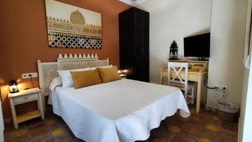 Una cama o camas en una habitación de La Esperanza