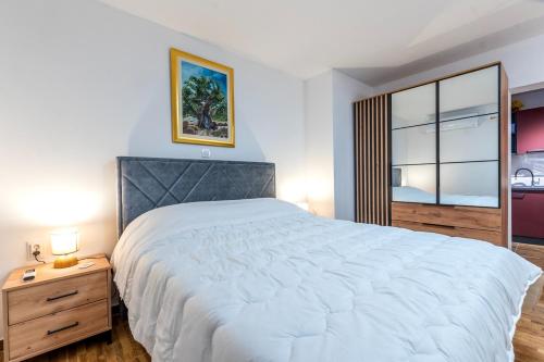 Ένα ή περισσότερα κρεβάτια σε δωμάτιο στο Apartment Marta - free parking!