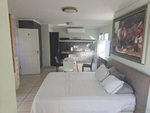 Postel nebo postele na pokoji v ubytování Cosy at Cowrie