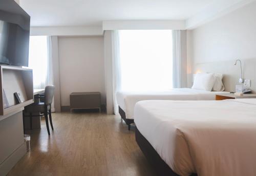 Radisson Recifeにあるベッド
