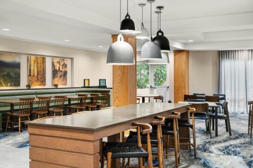 a dining room with a large table and chairs at Fairfield Inn and Suites by Marriott Birmingham Fultondale / I-65 in Fultondale